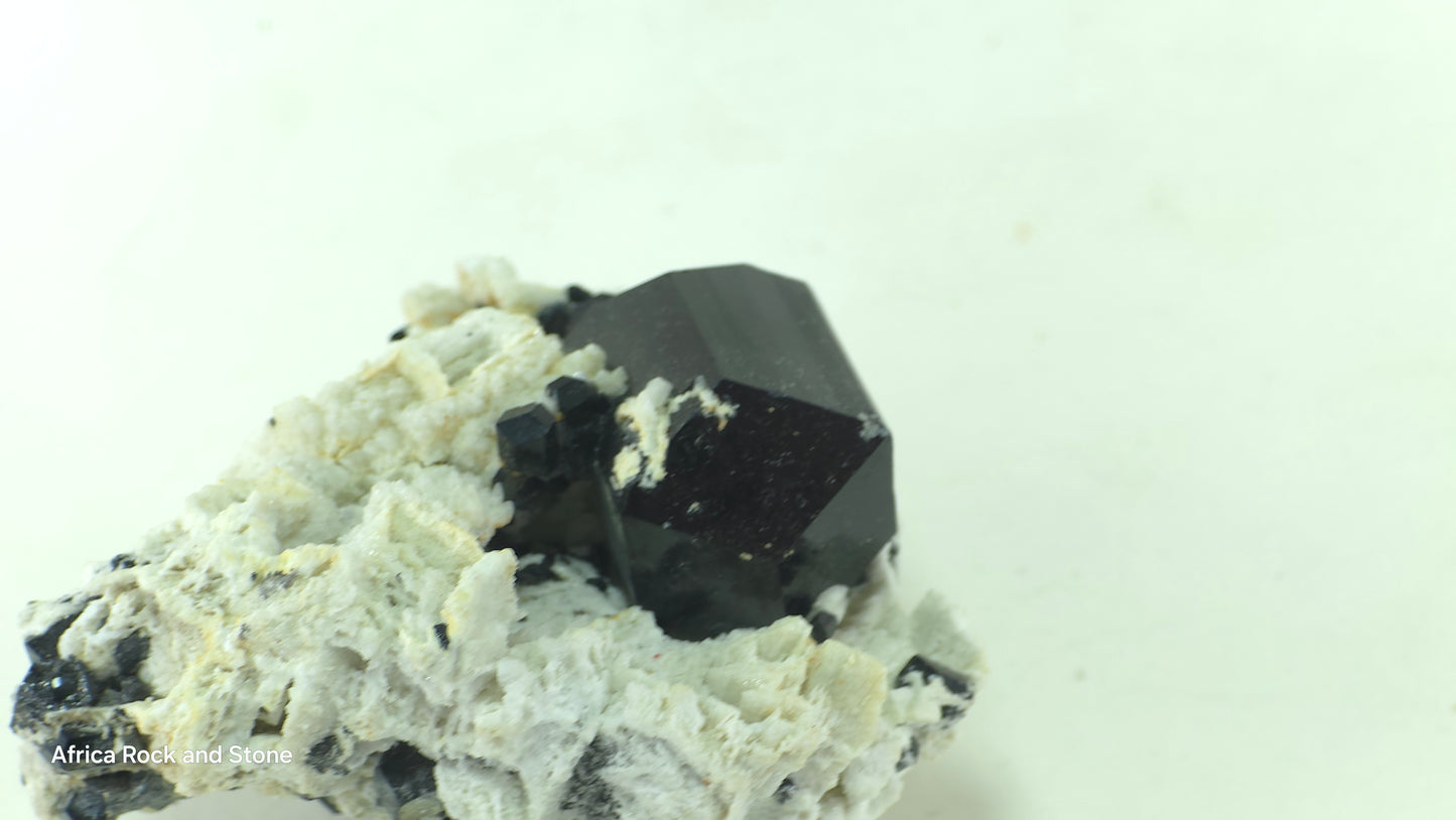 Double terminated perfect Black Tourmaline crystal on Feldspar