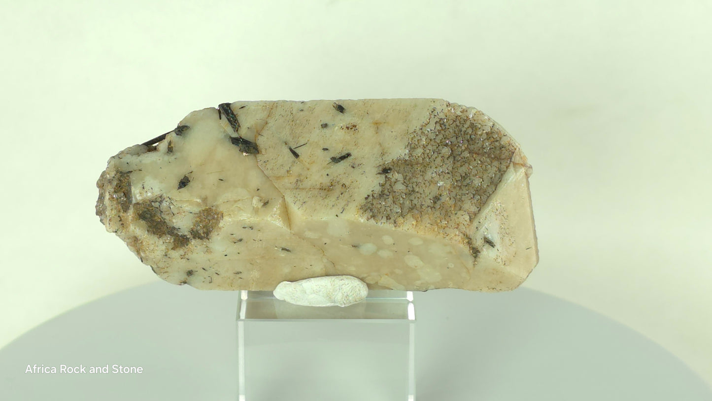 double terminated Feldspar crystal with Aegerine needles embedded