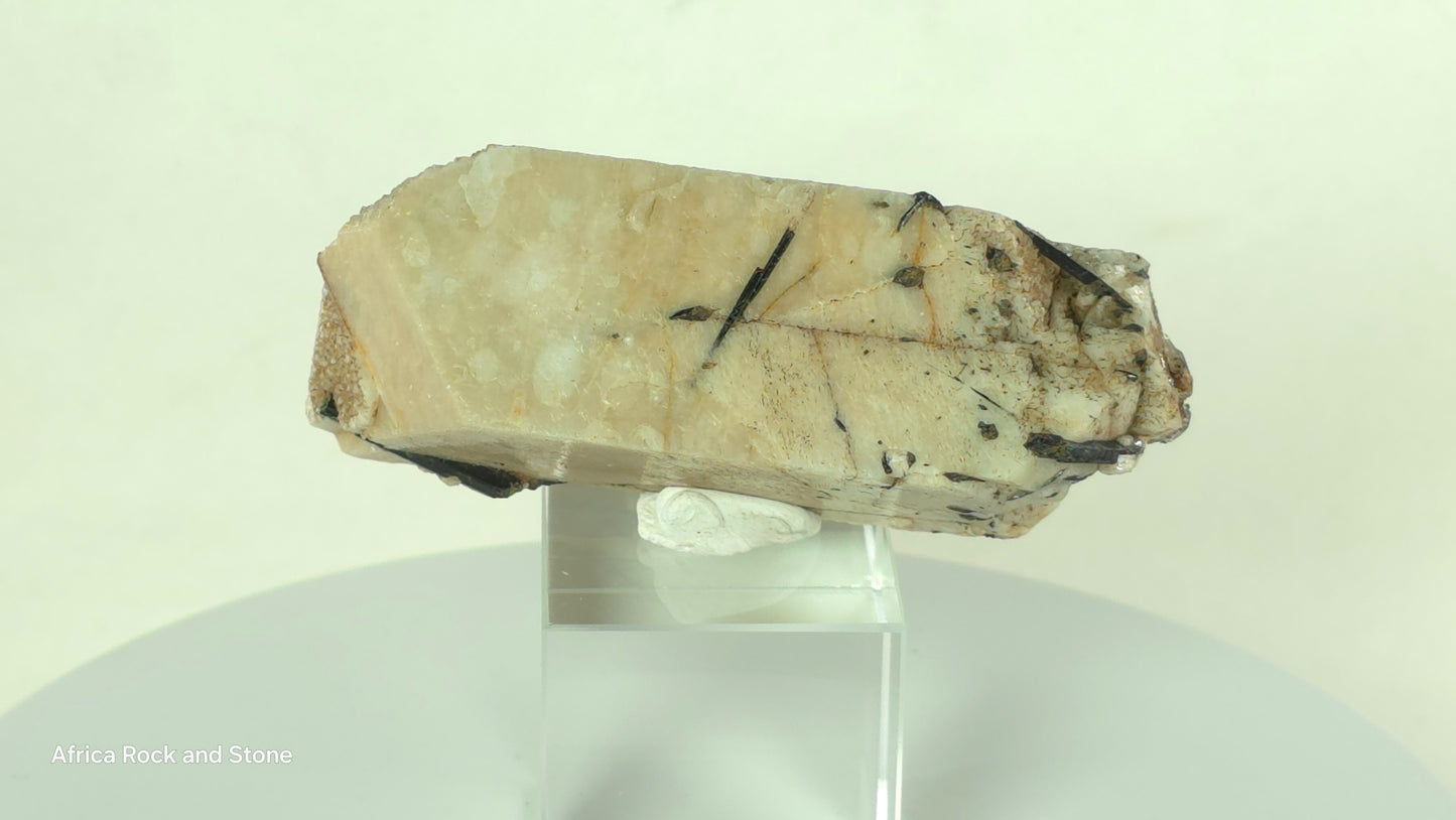 double terminated Feldspar crystal with Aegerine needles embedded