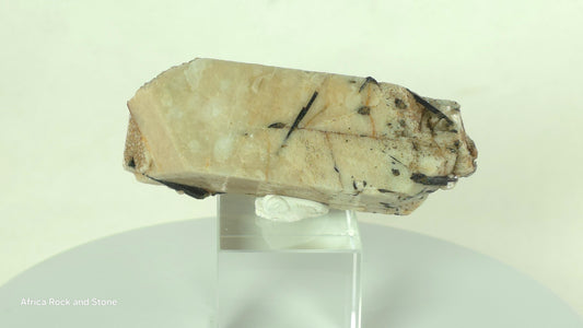 double terminated Feldspar crystal with Aegerine needles embedded