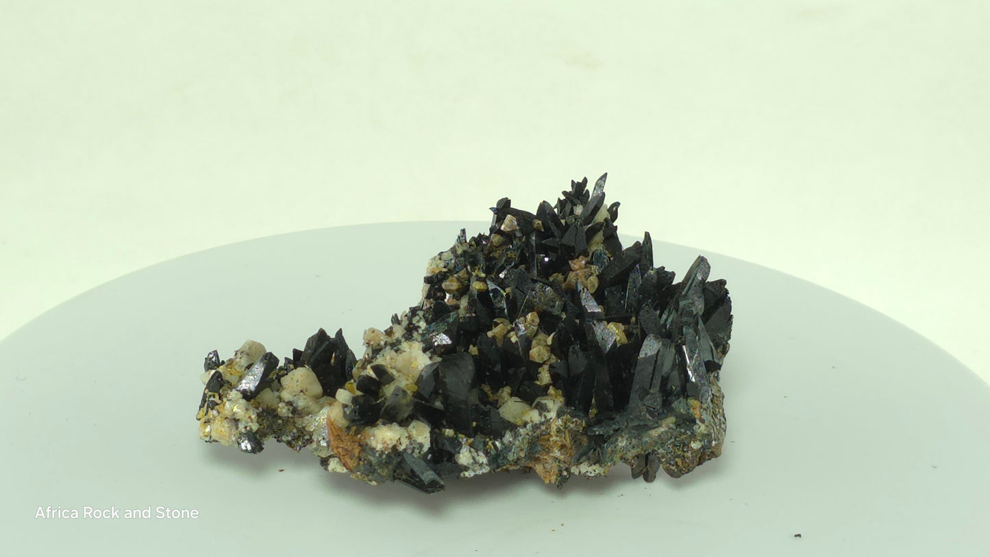 Aegerine cluster with feldspar crystals and tiny zircon crystals